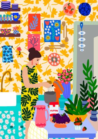 A Woman In A Kitchen With Flowers