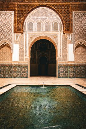 Symphony of Water and Stone: The Pool at Ben Youssef Madrasa