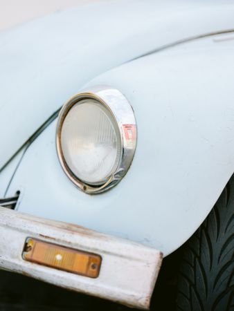 Pastel Volskwagen Beetle in the streets of Oaxaca Mexico